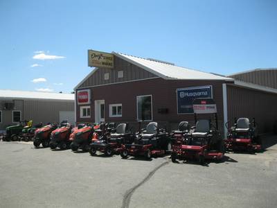 Lawn equipment displayed outside Doug's Service & Marine